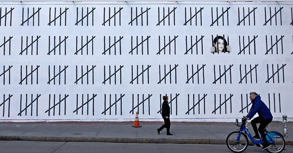 Banksy's 70-foot mural in New York tallying the days Dogan spent in prison Photo via Banksy's Instagram account