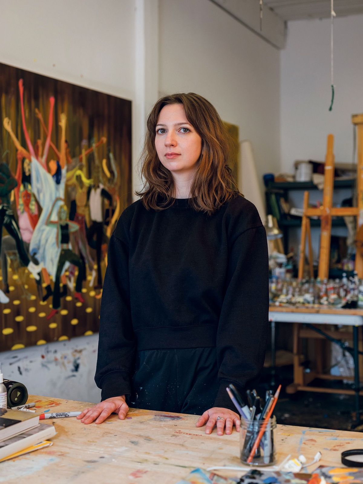 Think small: Maggie Ellis downsized to a Chinatown apartment in order to rent a larger studio in Dumbo Photo by Charlie Rubin; Courtesy Charles Moffett