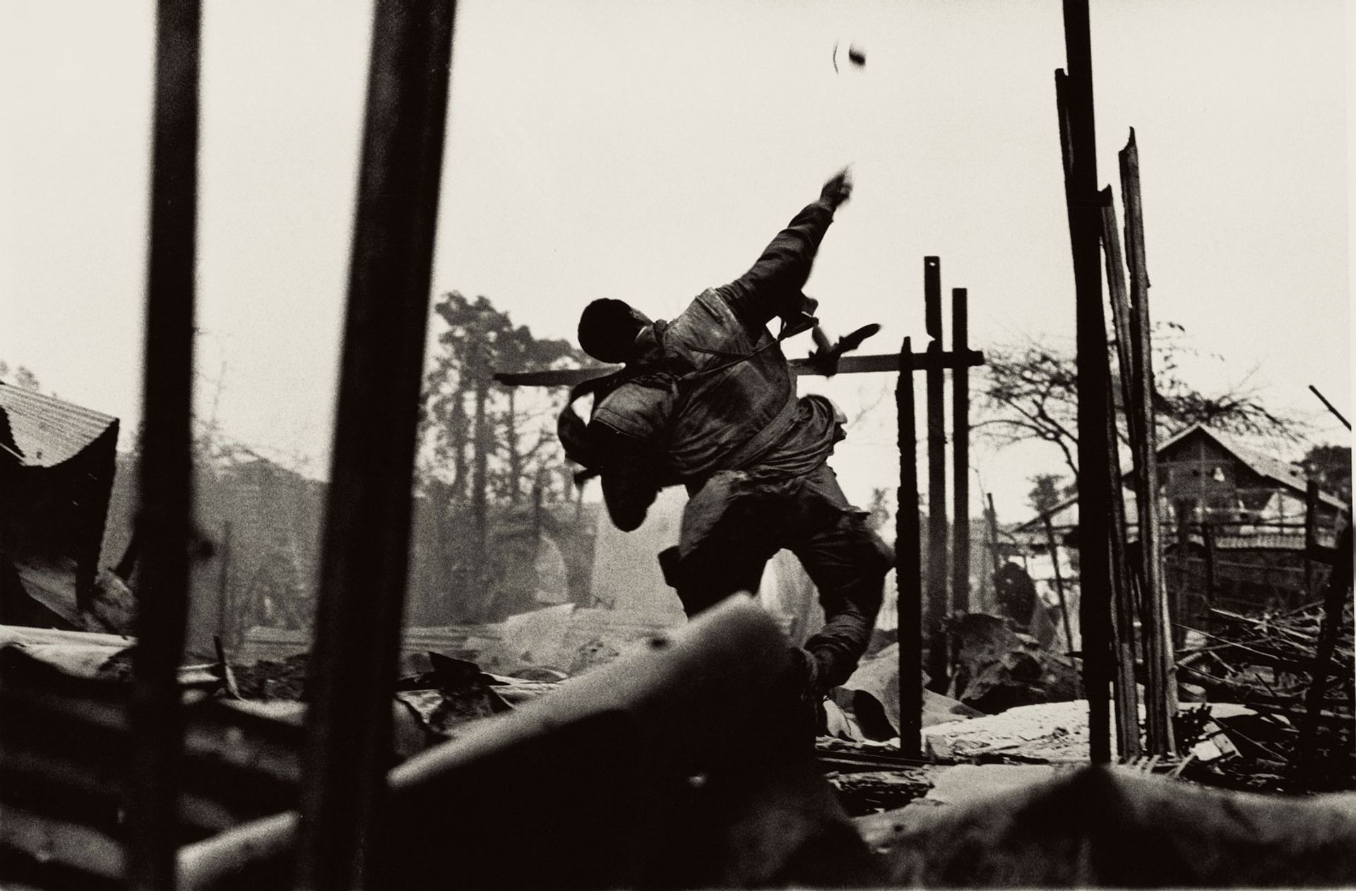 Grenade Thrower, Hue, Vietnam (1968) by Don McCullin is on show at Tate Britain © Courtesy of Don McCullin