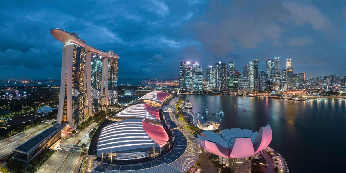 Marina Bay Sands, site of Art SG 2025, with Singapore city skyline at night robertharding/Alamy Stock Photo