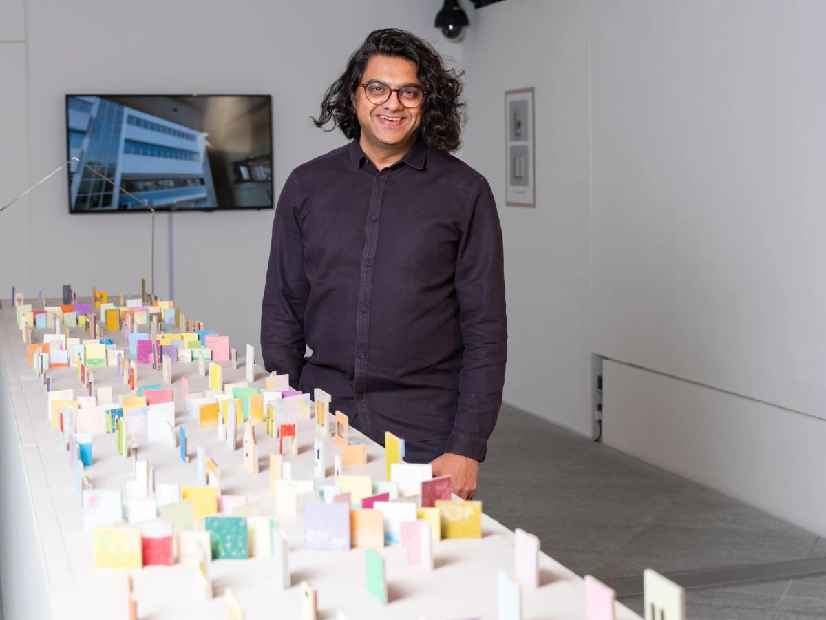 Vikram Divecha at the Louvre Abu Dhabi with his work Wall House (2022)
Photo: Augustine Paredes – Seeing Things. Courtesy Department of Culture and Tourism, Abu Dhabi. Artwork © the artist