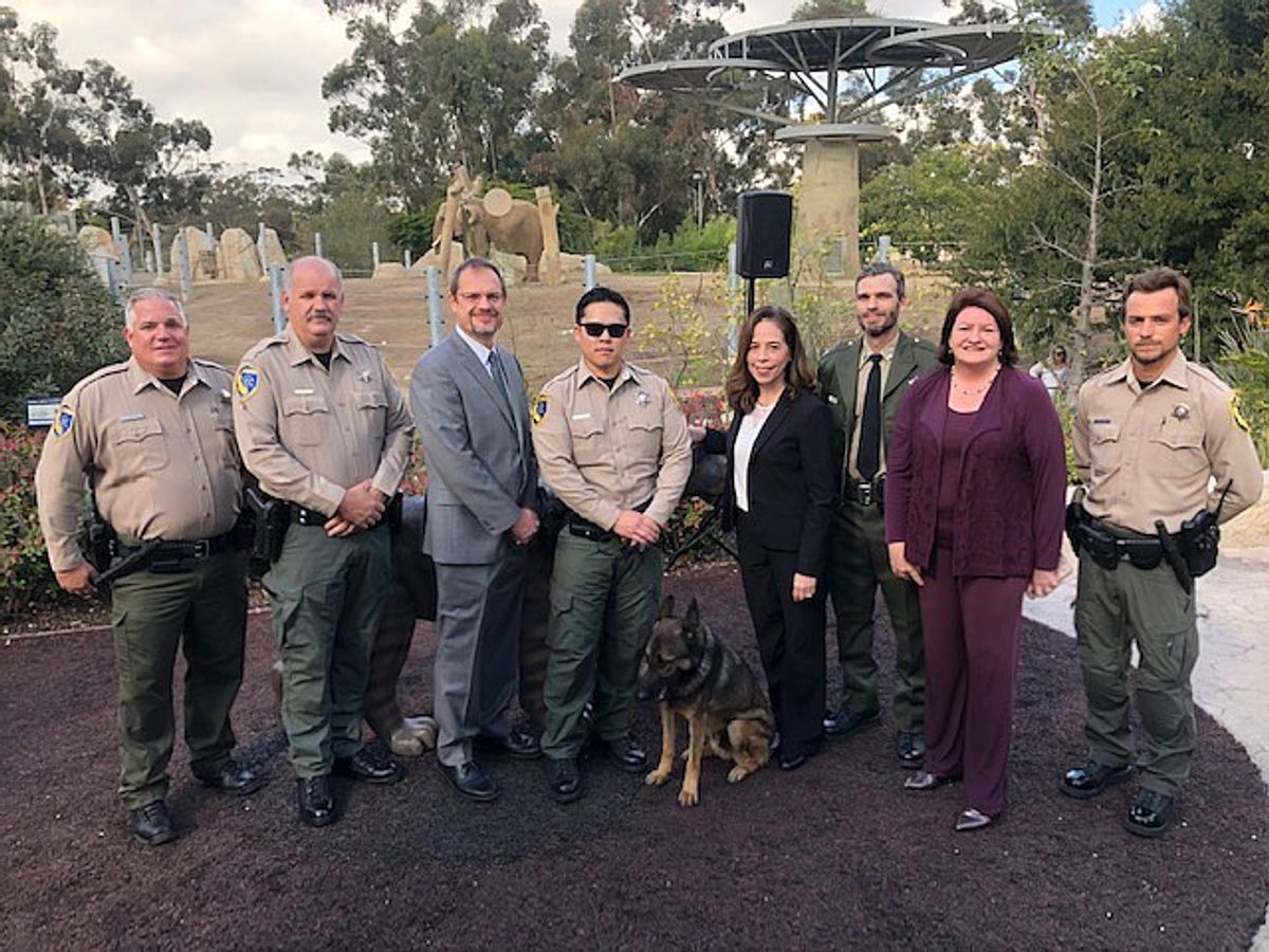 San Diego City Attorney Mara Elliott with officers from California's Department of Fish and Wildlife at the San Diego Zoo on 28 November Photo: Hilary Nemchik and courtesy of the San Diego City Attorney's Office