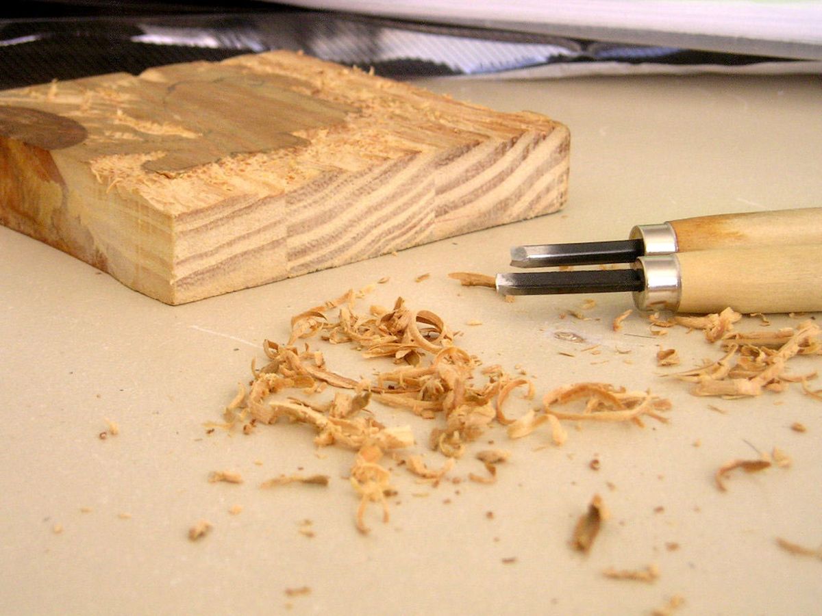 Carving a woodblock to create a print Photo by tainara ., via Flickr