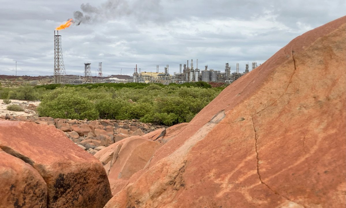 Ancient rock art site under threat as Australian government provisionally extends 'carbon bomb' gas project