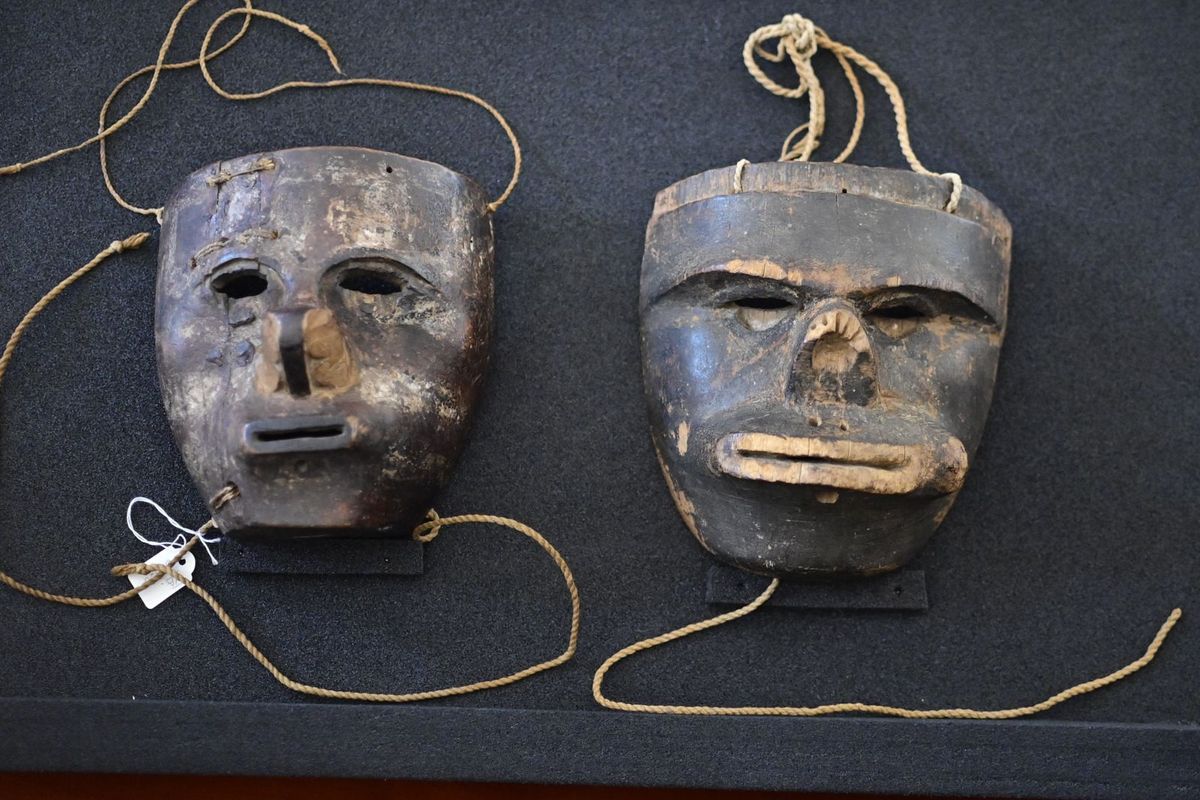 The two Kogi masks during the restitution ceremony last week. Courtesy Cristian Garavito/ Presidencia de la República