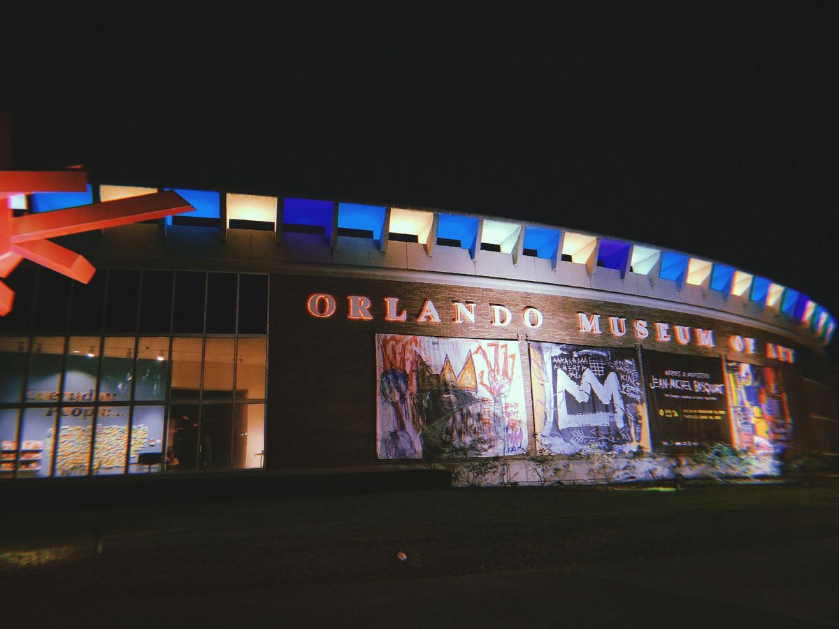 The exterior of the Orlando Museum of Art with banners promoting its Basquiat exhibition Photo by Athena Iluz/Flickr