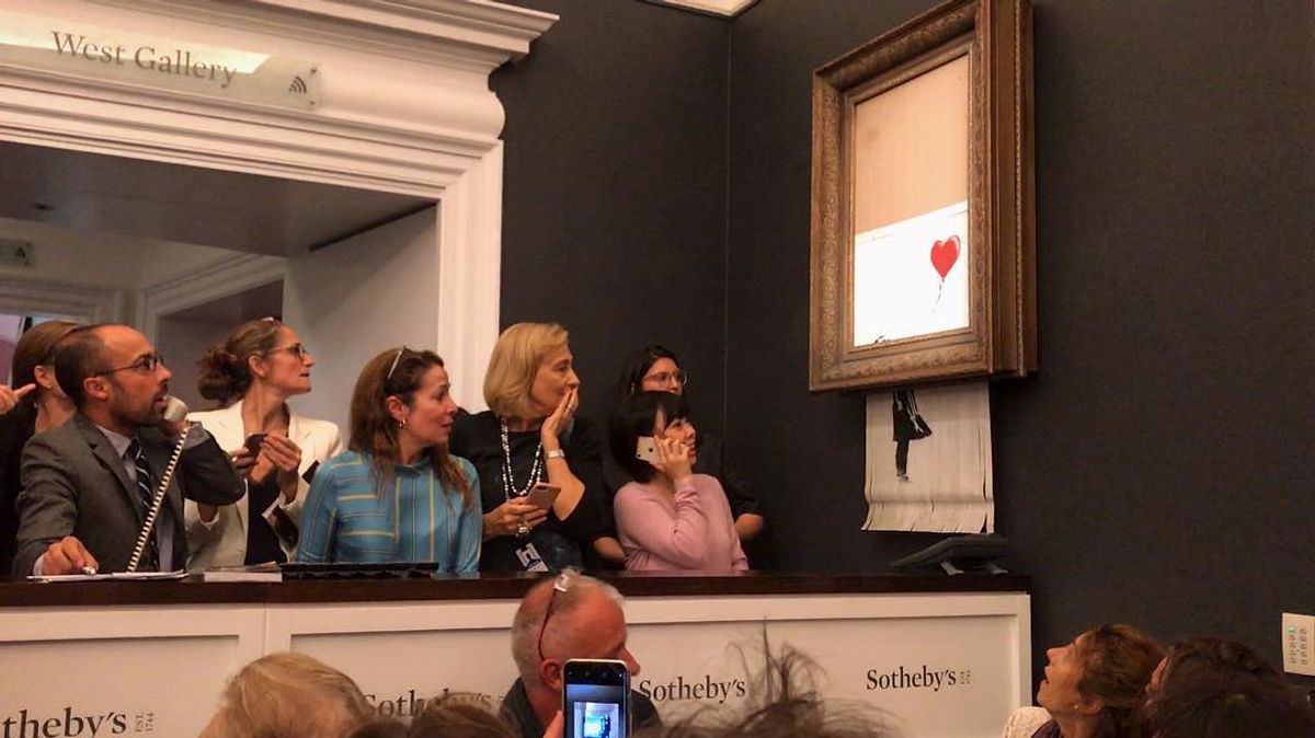 Going, going, gone...Banksy's Instagram post of the moment his million-pound work went through the shredder at Sotheby's banksy/Instagram