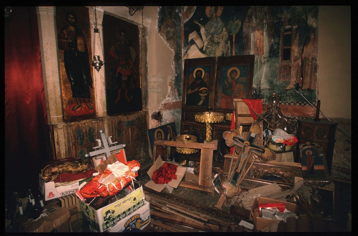 A store of looted artefacts from bombed churches in Pec, Kosovo, towards the end of the Yugoslav wars of the 1990s. Photo: Scott Peterson/Liaison