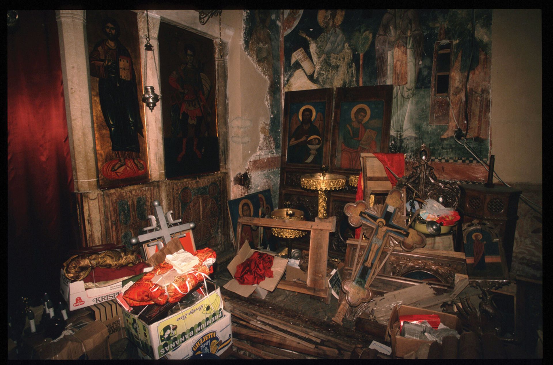 A store of looted artefacts from bombed churches in Pec, Kosovo, towards the end of the Yugoslav wars of the 1990s. Photo: Scott Peterson/Liaison