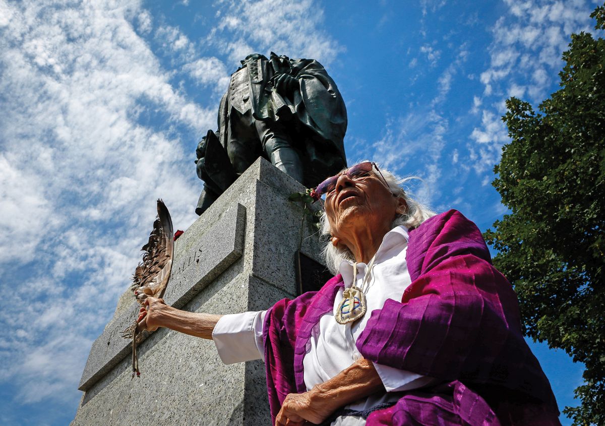 Isabelle Knockwood, an elder of the Mi’kmaq Nation, at the statue of Edward Cornwallis, who put a bounty on the heads of members of the indigenous group REUTERS/Chris Donovan