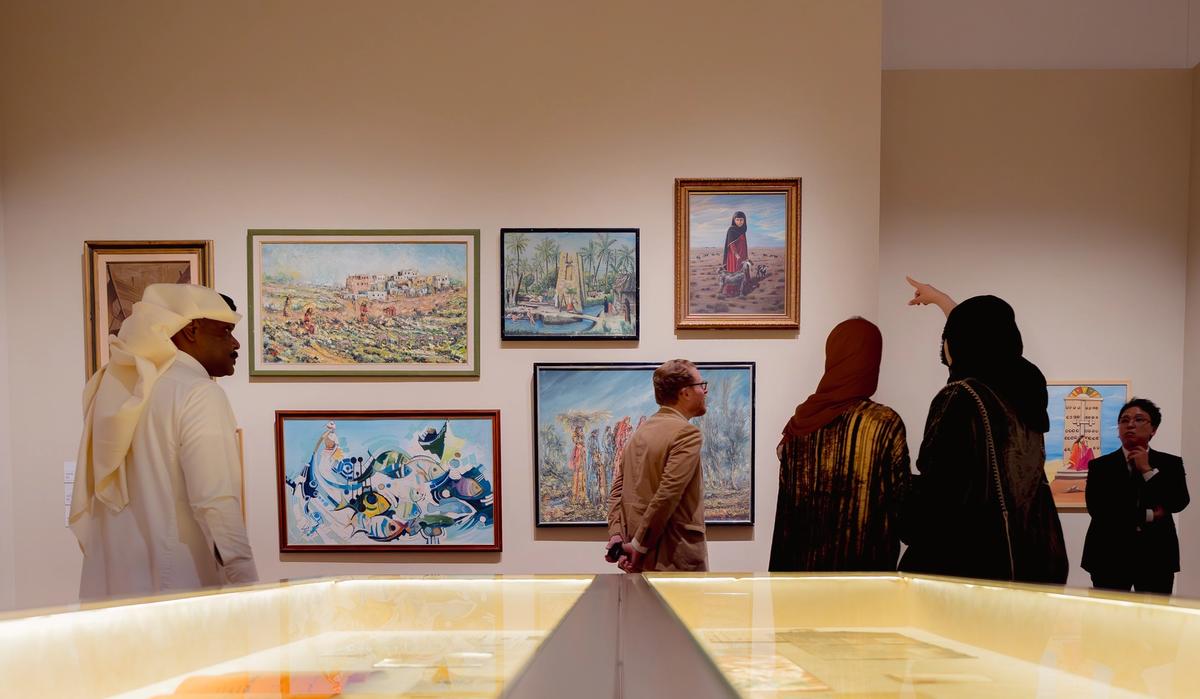 Visitors at the Beginnings of Saudi Art Movement exhibition
