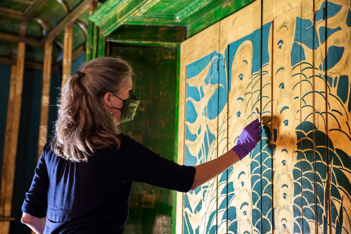 Conservation work being done on James McNeill Whistler's Peacock Room at the National Museum of Asian Art. Courtesy National Museum of Asian Art, Smithsonian Institution, Washington, DC