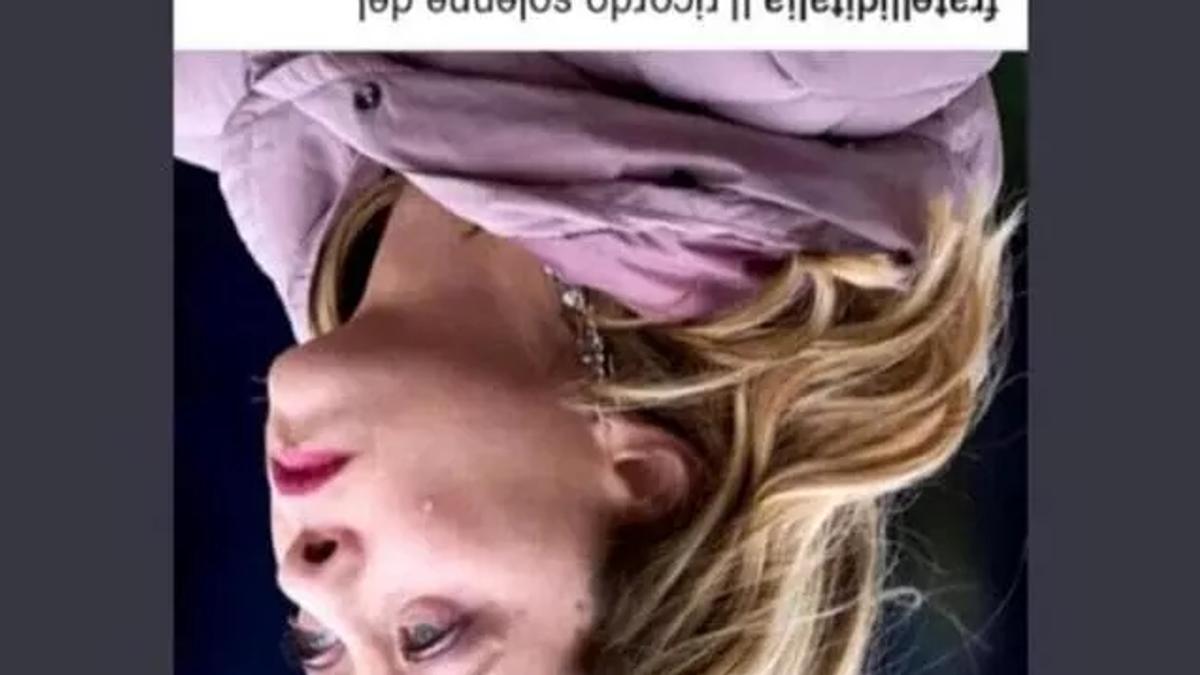 The inverted images have been interpreted as a reference to Mussolini's corpse hung in Milan's Piazzale Loreto after Italian partisans executed him in 1945