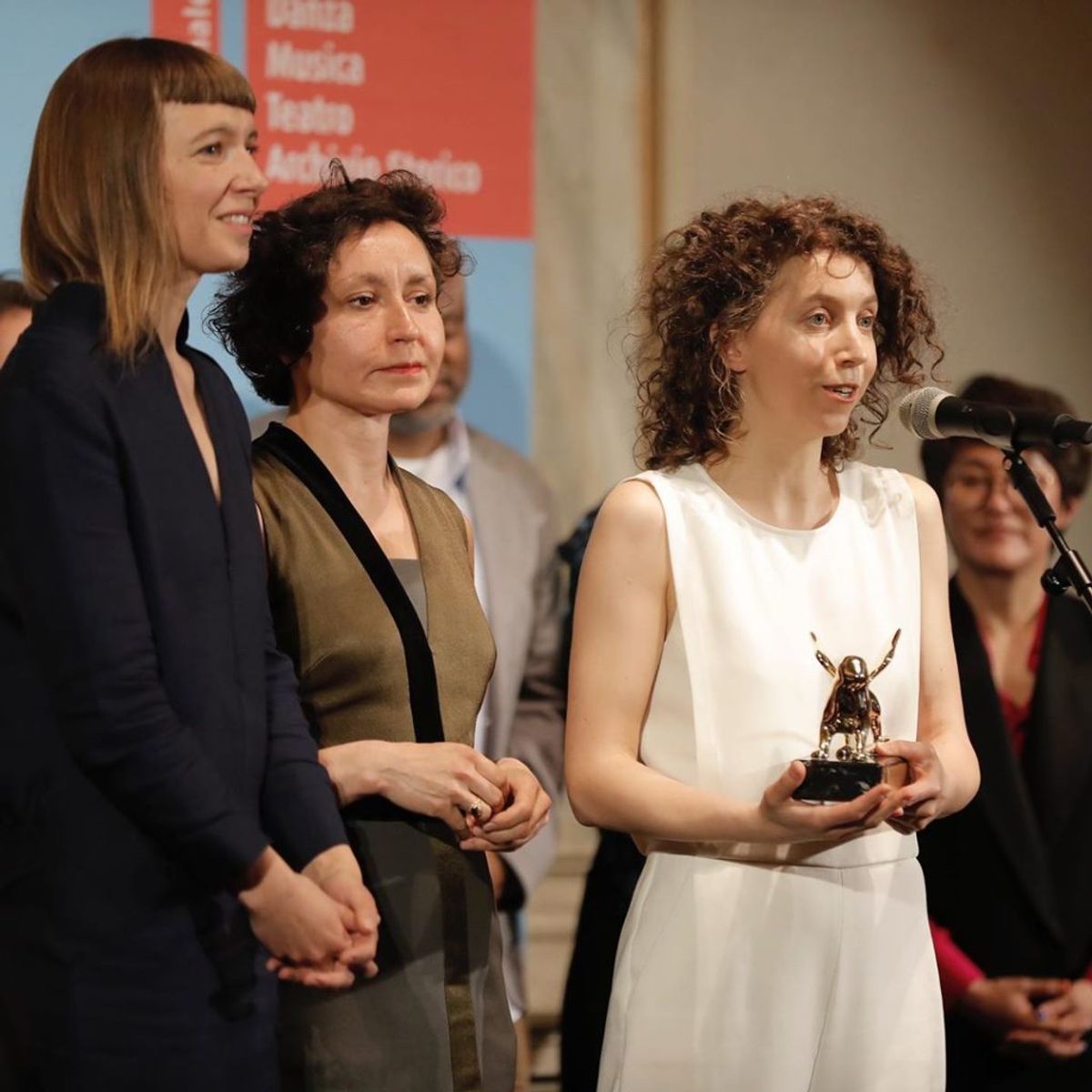 Rugilė Barzdžiukaitė accepts the Golden Lion courtesy Venice Biennale