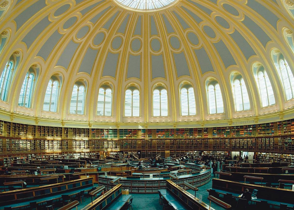 The Reading Room in happier times, in the early 2000s, not long after the British Library moved to its new purpose-built home in Kings Cross. For now, the space is used for storage and handing of the museum’s archives The Trustees of the British Museum