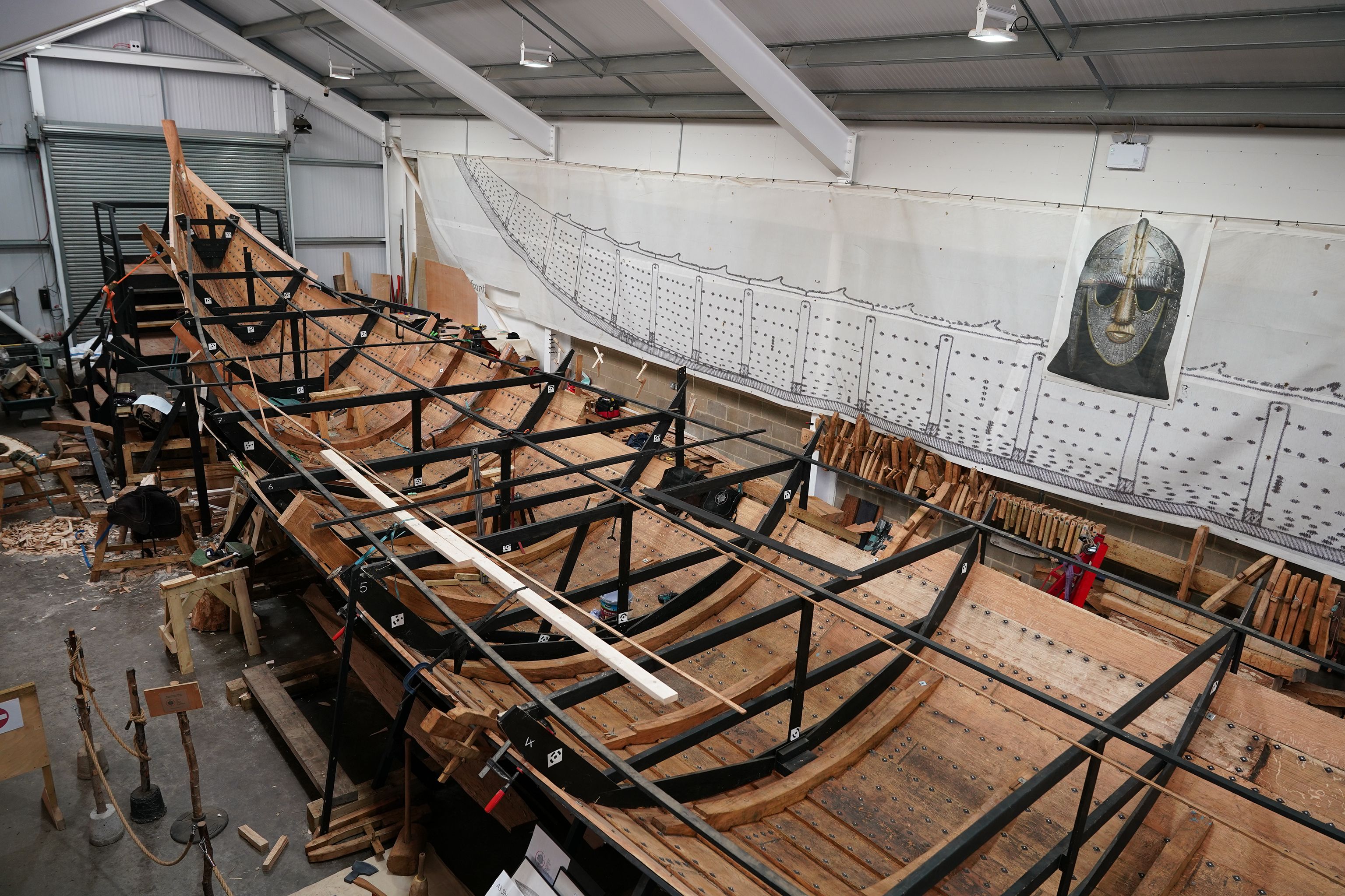 Reconstruction of the Sutton Hoo ship in process in the Longshed in Suffolk. The ship was discovered buried in the ground in 1938 along with a host of Anglo-Saxon treasures © Andy Mills; Applied Risk Management Ltd