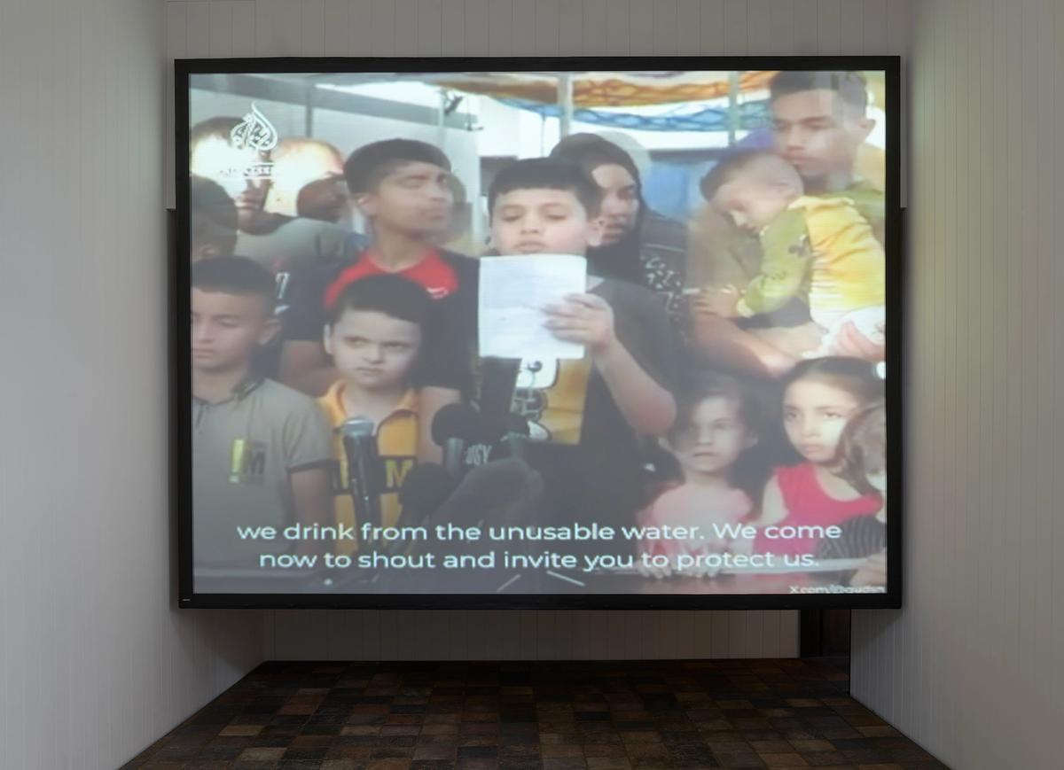 One of the works in the show is a video featuring footage of a mock “press conference” held by children outside al-Shifa hospital in Gaza City dating from 7 November 2023 Courtesy of Tramps