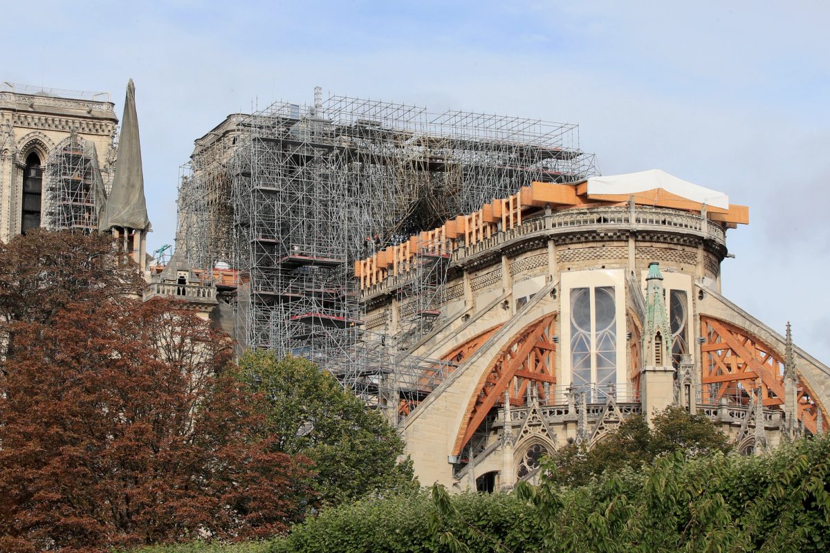 In October, French Culture Minister Franck Riester said the melted scaffolding atop Notre Dame Cathedral will be removed "in coming weeks" to allow restoration work to begin AP Photo/Michel Euler