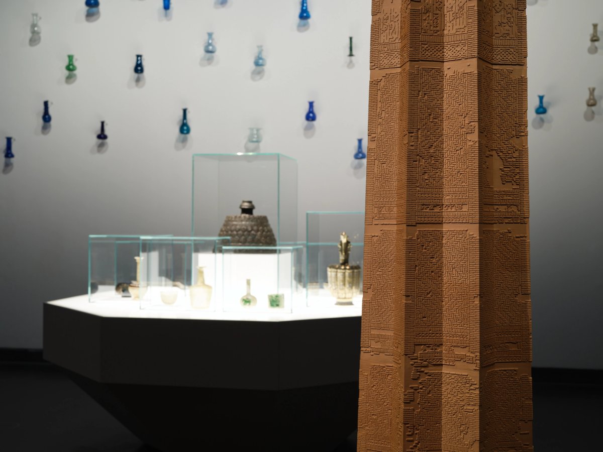 Installation view with an early 13th-century ewer (Ghurid or Ilkhanid period) with silver and copper inlaid decoration displayed on the far right
Photo: Museum of Islamic Art, Doha