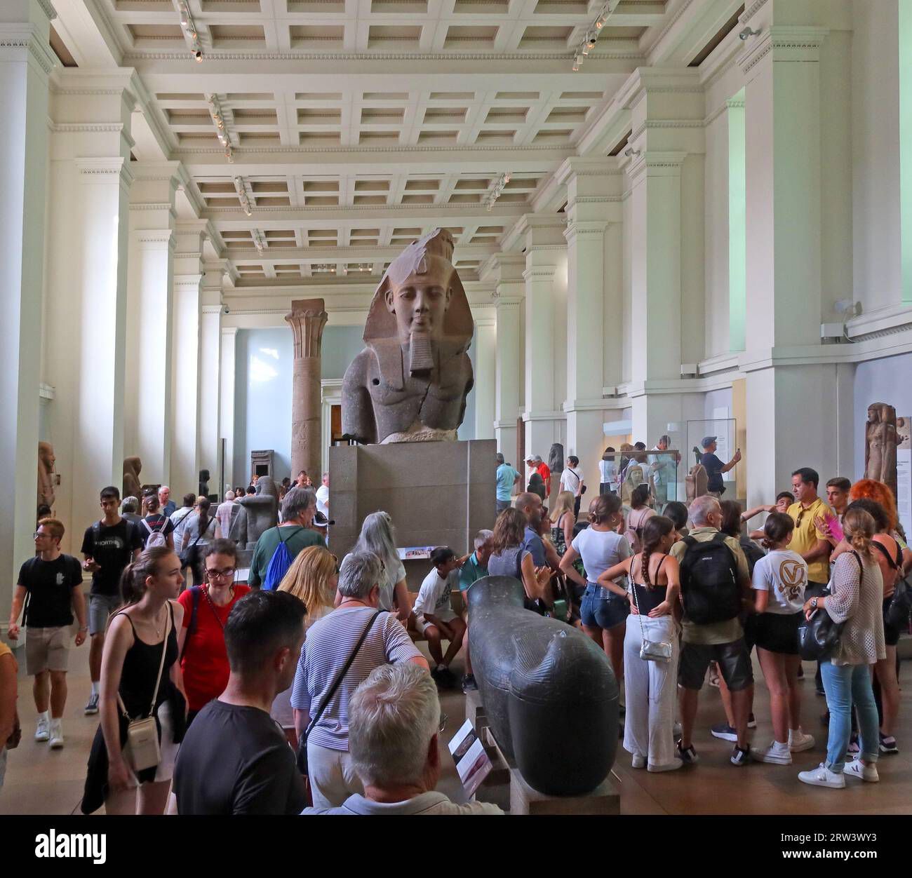 Visitors in the Ancient Egypt room viewing the granite head of King Amenhotep III at the British Museum Credit: Tony Smith / Alamy Stock Photo. Portrait: © Garry J. Shaw