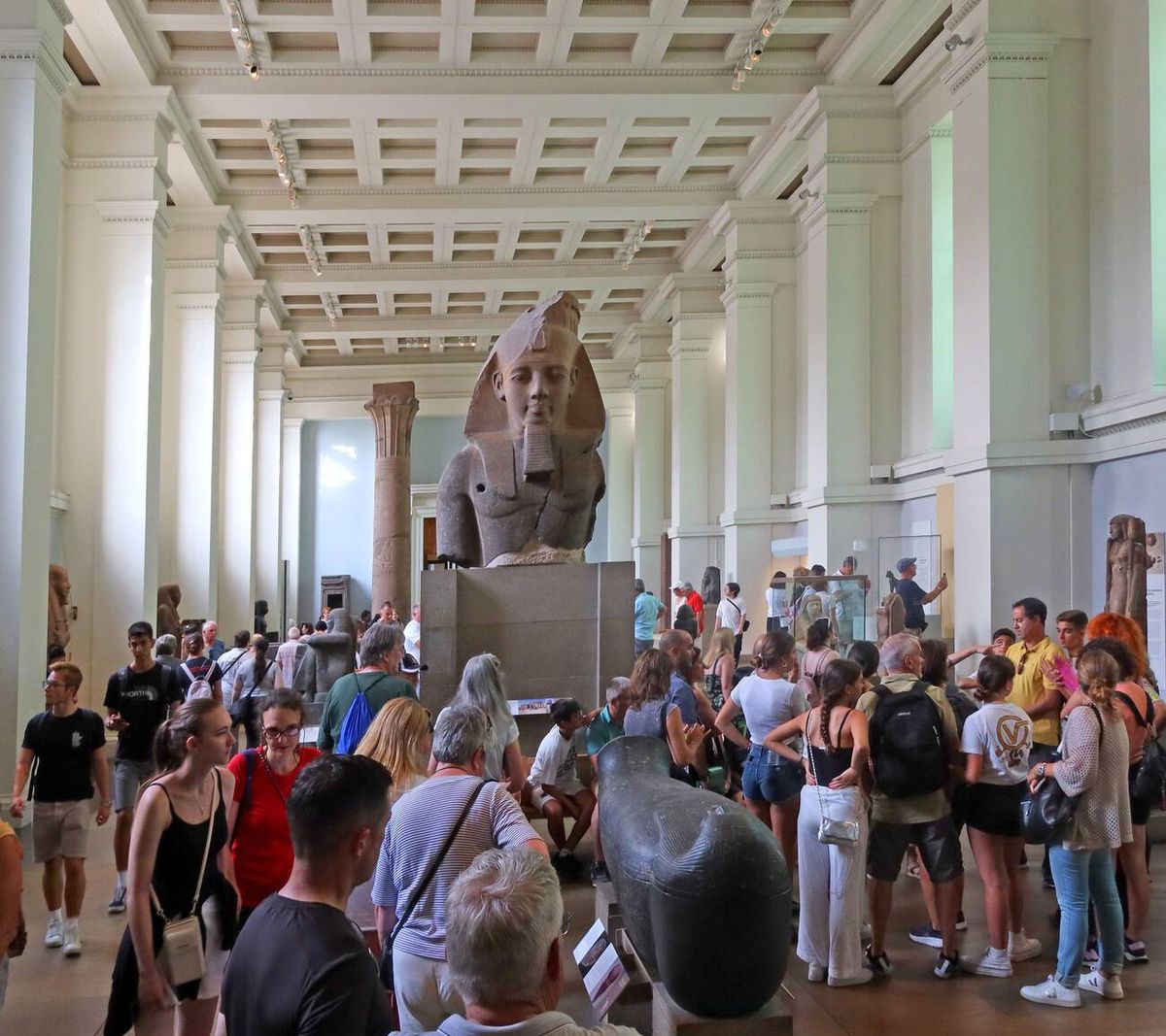 Visitors in the Ancient Egypt room viewing the granite head of King Amenhotep III at the British Museum Credit: Tony Smith / Alamy Stock Photo. Portrait: © Garry J. Shaw