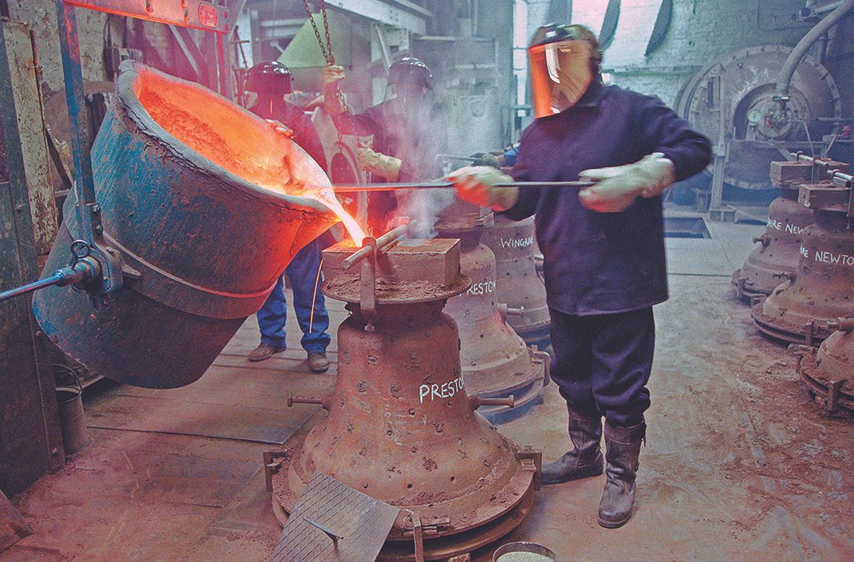 Workers at the Whitechapel Bell Foundry, which had been casting bells for more than 400 years qaphotos.com / Alamy Stock Photo