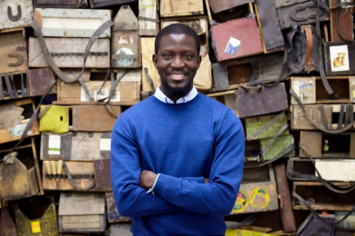 Ibrahim Mahama with his installation Parliament of Ghosts at the Whitworth in Manchester © White Cube. Photo: George Darrell