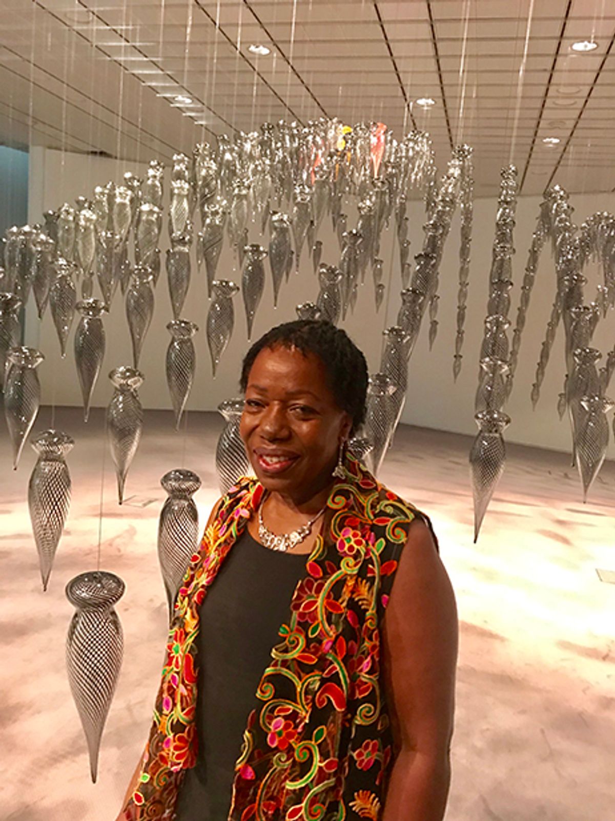 Magdalene Odundo in front of Transition II Courtesy Louisa Buck