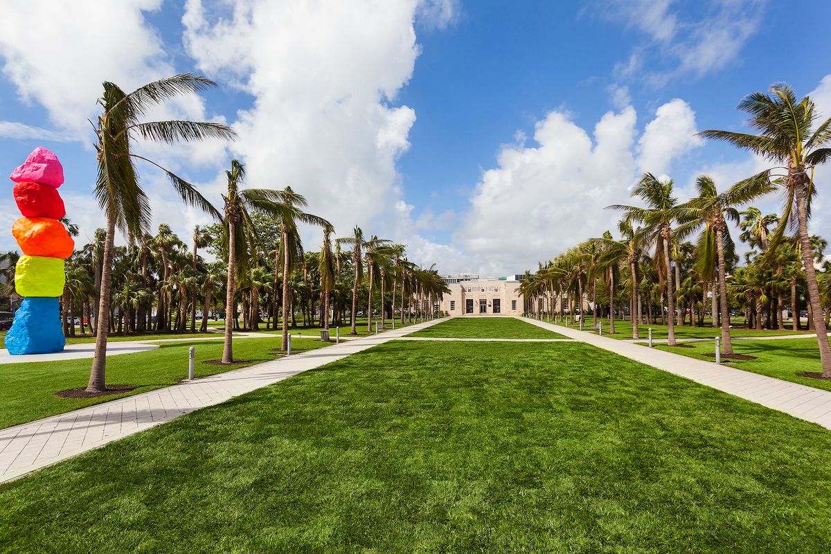 View of the Bass Museum of art in Collins Park, with Ugo Rondinone's Miami Mountain (2016) at left Photo by Zachary Balber, courtesy of the Bass Museum of Art, Miami Beach