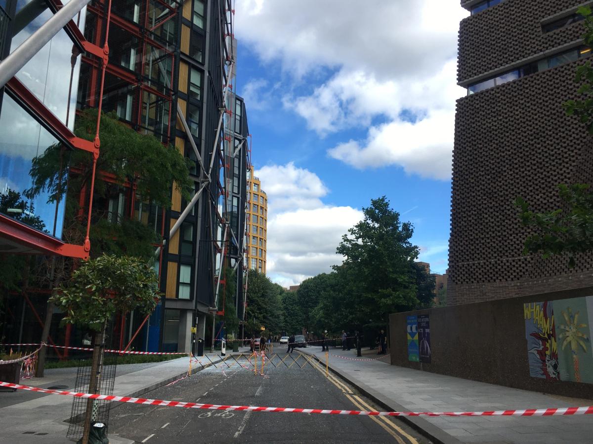 Shattered glass is visible on the road outside Tate Modern after window panels fell from the neighbouring building. Photo: Katherine Hardy