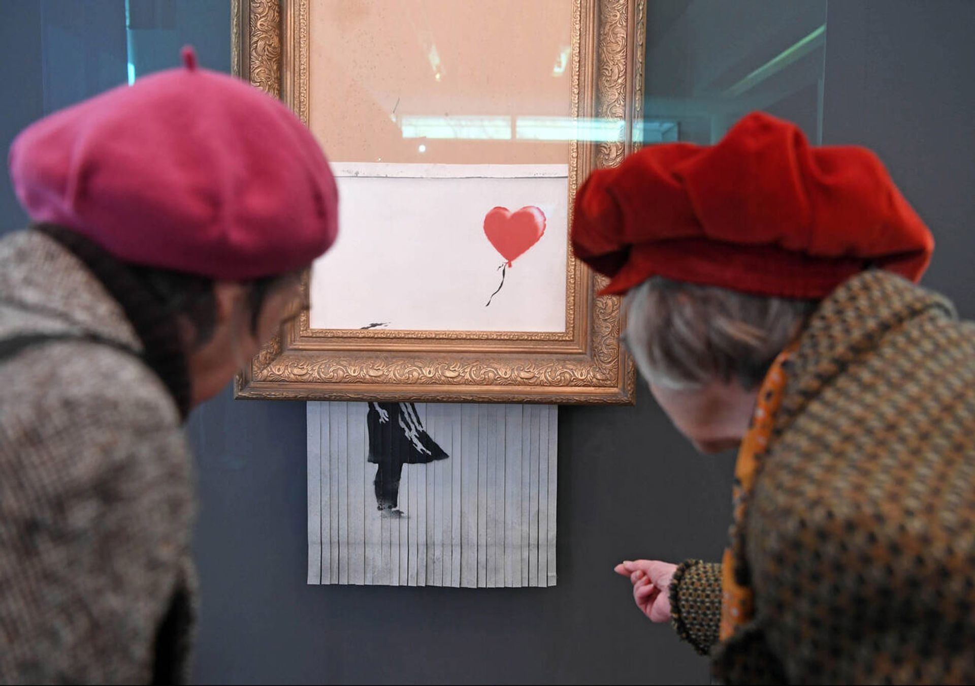 Banksy’s infamous self-shredding work sold for the second time in October for £18.6m, making the owner a tidy profit. Uli Deck/dpa/Alamy Live News