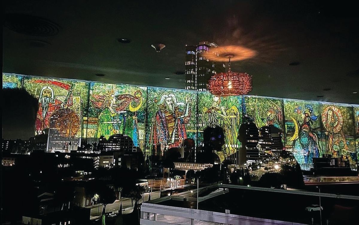 Behind the bar at Sant’olina, the newly opened restaurant on the roof of the Beverly Hilton hotel, is a commanding glass mosaic