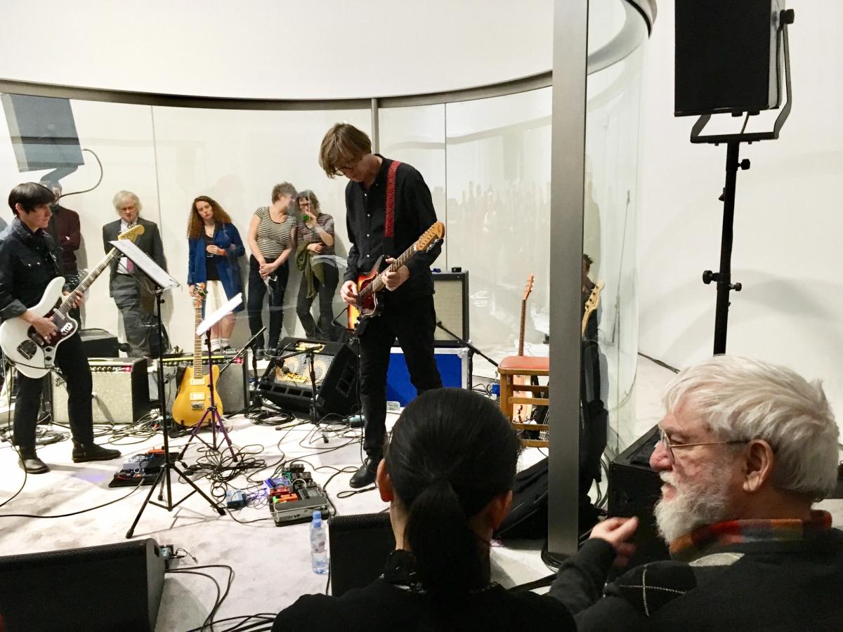 Dan Graham watching as Thurston Moore and Debbie Googe perform Photo: Louisa Buck