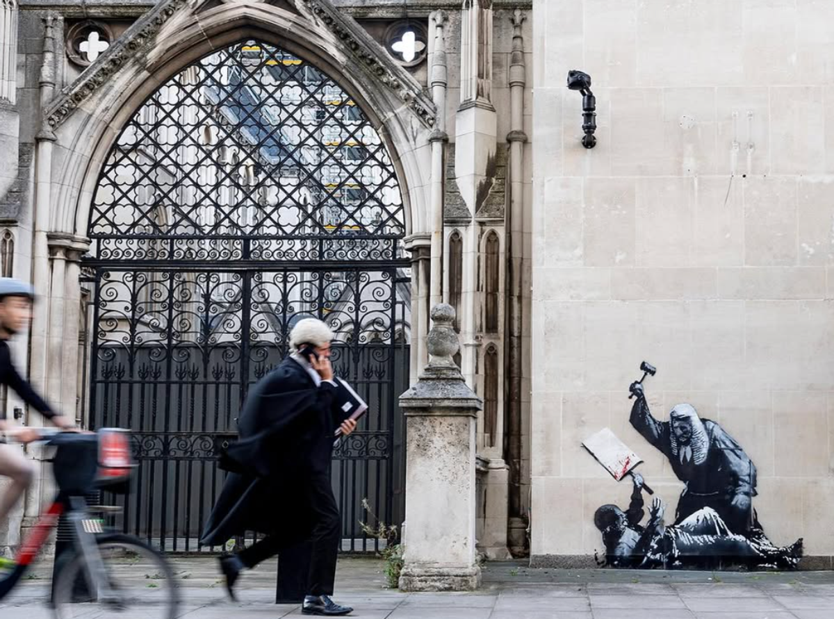 The work appeared on on the external wall of the Queen’s Building
Bansky via Instagram