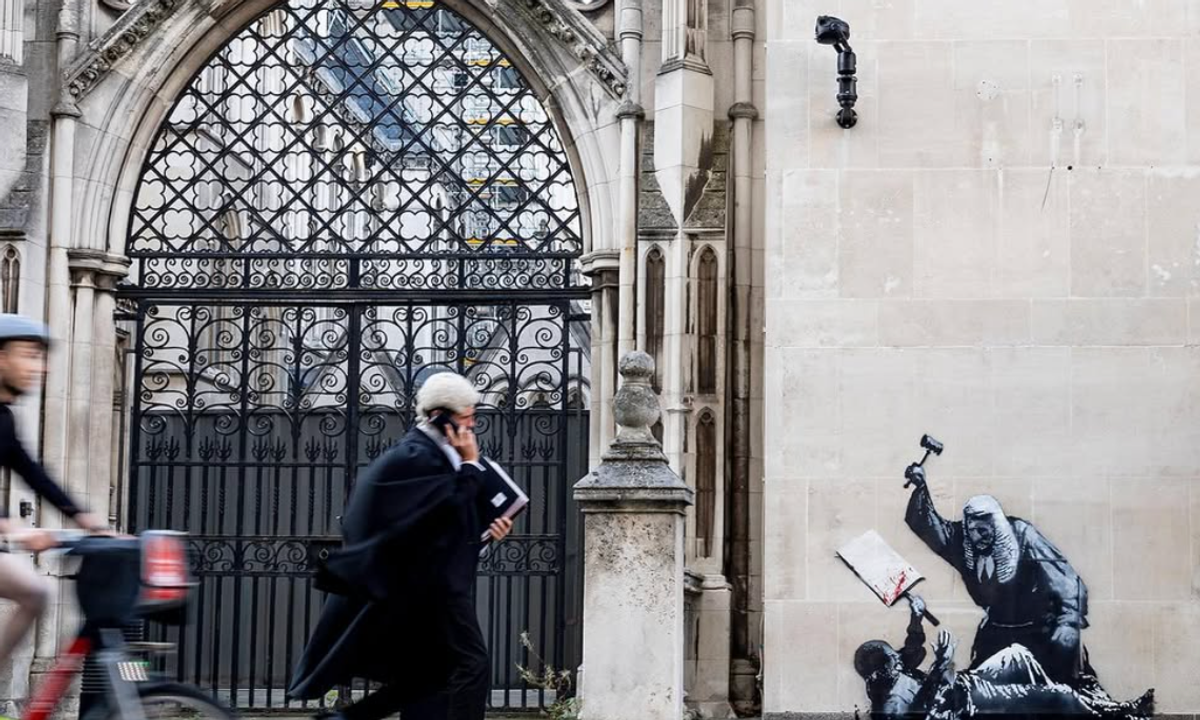 New Banksy showing judge beating protestor covered within hours