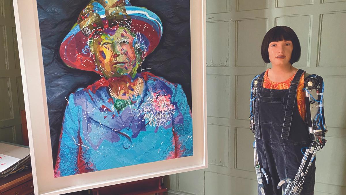 Ai-da posing with her portrait of Queen Elizabeth II

Courtesy Aidan Meller