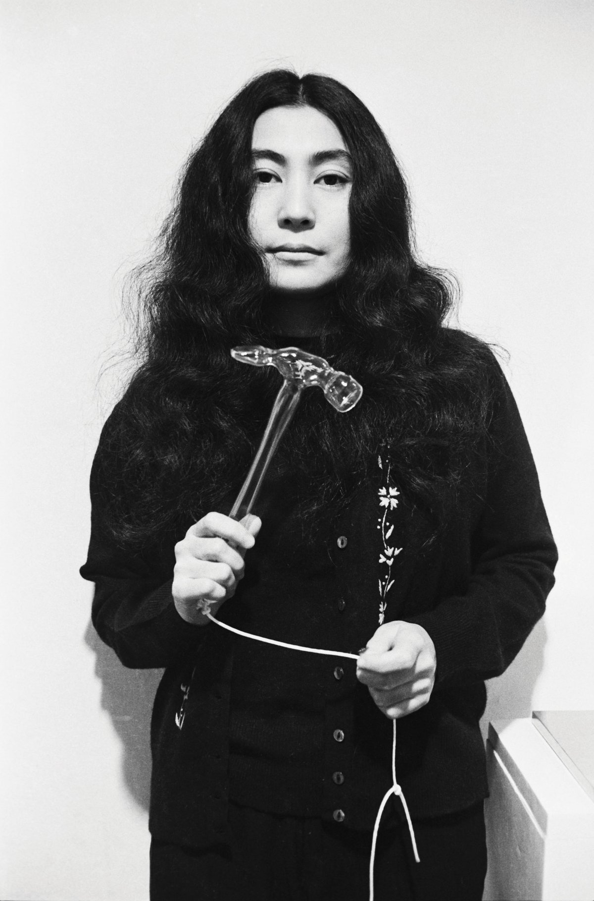 Yoko Ono photographed with her work Glass Hammer (1967) Lisson Gallery; London; 1967. Photo © Clay Perry