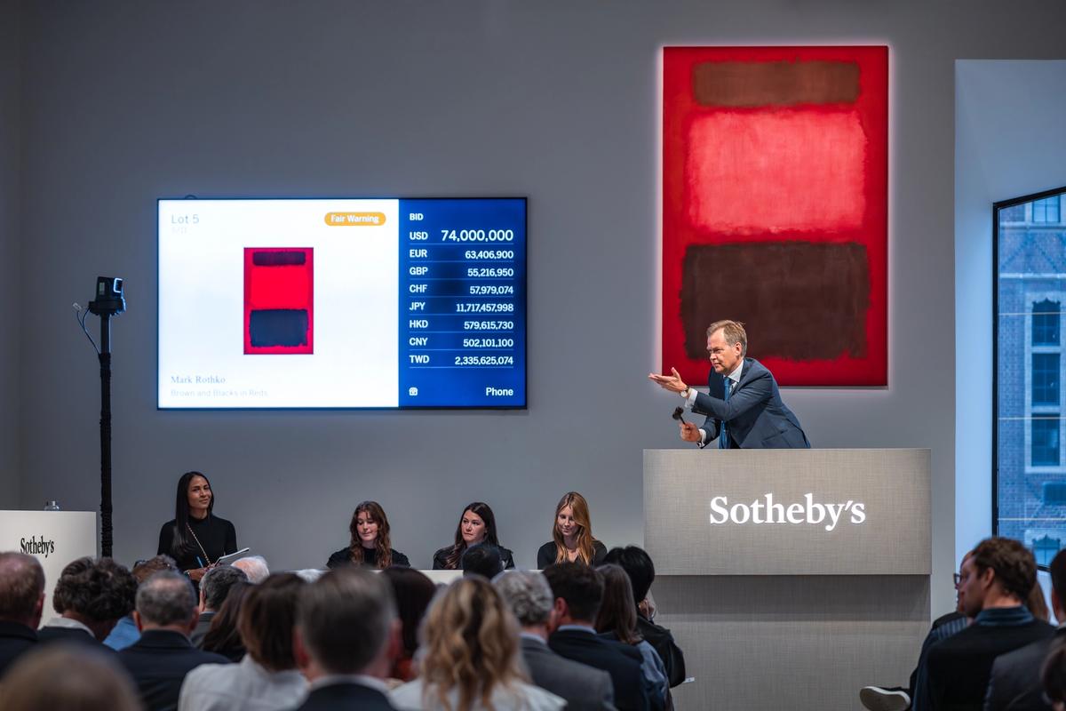 Auctioneer Oliver Barker sells Rothko's Brown and Blacks in Reds from 1957
Courtesy Sotheby's