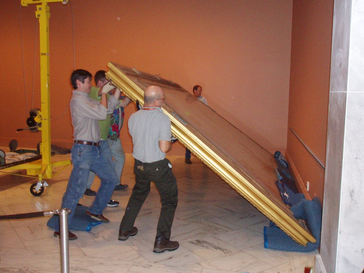 Workers at the Smithsonian American Art Museum moving a large Thomas Moran painting Photo courtesy Smithsonian American Art Museum, via Flickr
