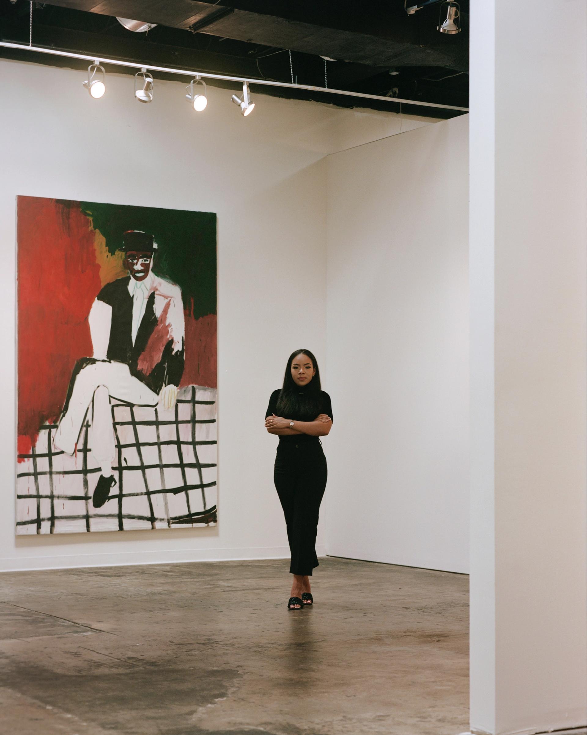 Founder and director of Atlanta Art Week Kendra Walker in front of Still Untitled by Patrick Eugene. Photo by Piera Moore. Courtesy of Atlanta Art Week