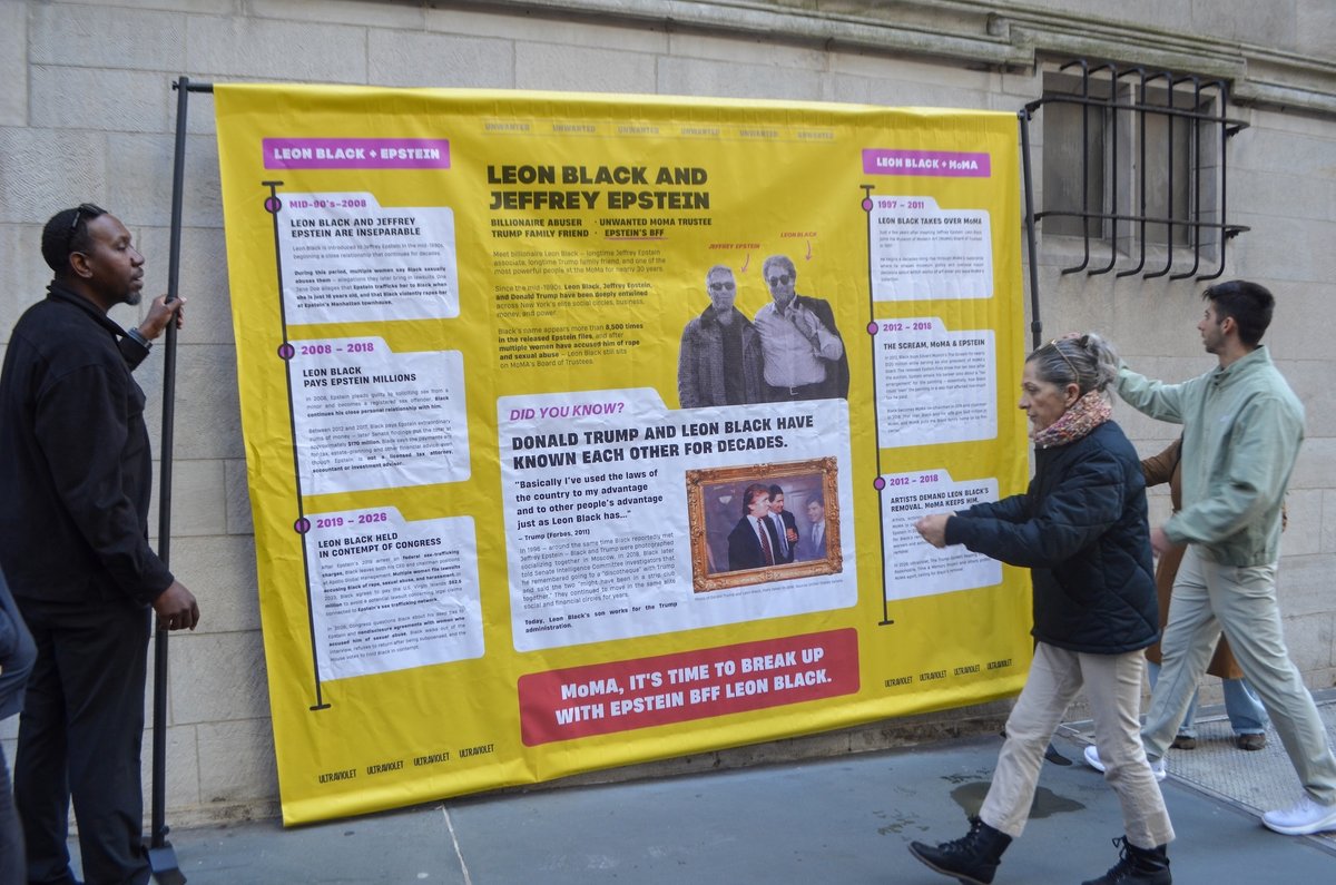 Activists erect a banner down the block from the Museum of Modern Art outlining the connections between its trustee Leon Black and the late sex offender Jeffrey Epstein Photo © Isa Farfan
