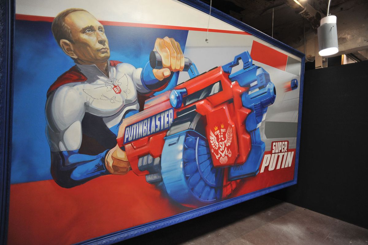 A painting depicting Russian president Vladimir Putin at the Superputin exhibition at UMAM museum in Moscow in December Aleksander Demchenko