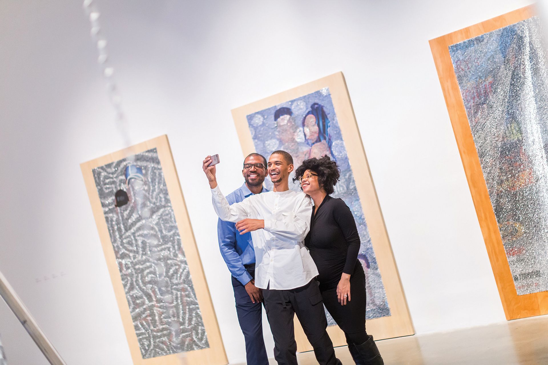 The artist Wilmer Wilson IV with friends at the New Museum Triennial Photo: Scott Rudd/Courtesy New Museum