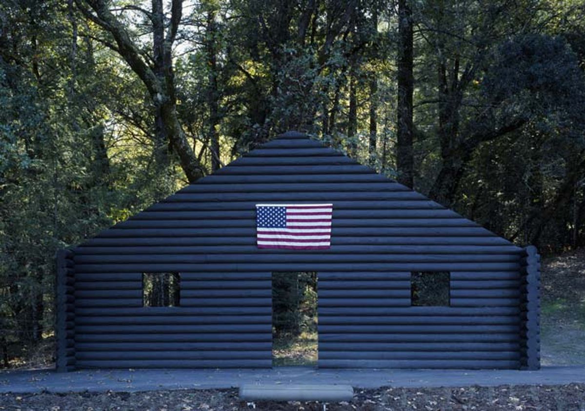 A different version of Cady Noland's Log Cabin, Blank with Screw Eyes and Café Door (Memorial to John Caldwell) (1993), from the collection Norman & Norah Stone Photo: stonescape.us
