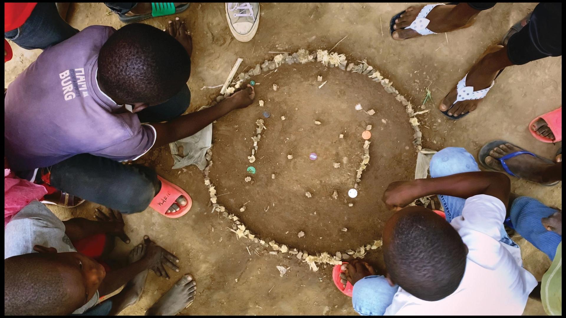Children in the Democratic Republic of Congo playing a game, in Alÿs’s work for the Biennale © the artist