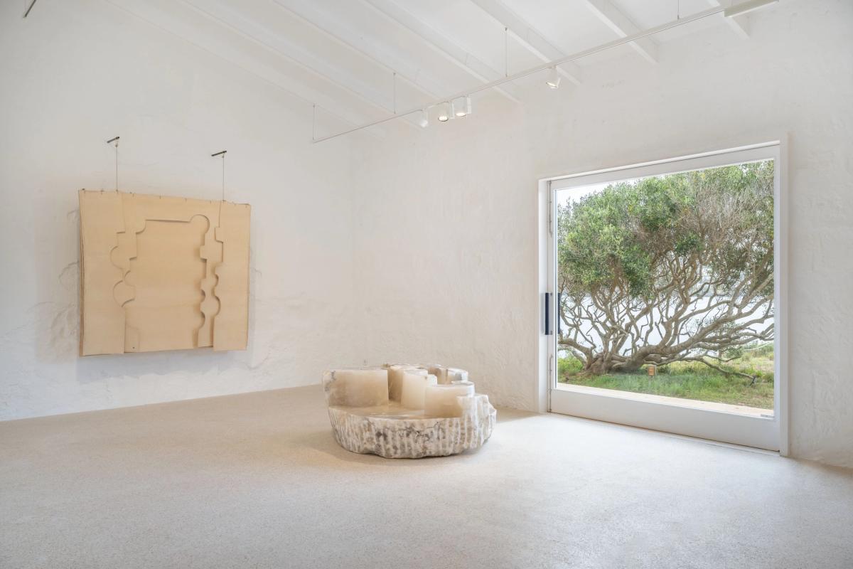 An installation view of Chillida in Menorca at Hauser & Wirth Menorca © Zabalaga Leku. San Sebastián, VEGAP, 2024; Courtesy of the Estate of Eduardo Chillida and Hauser & Wirth; Photo: Damian Griffiths