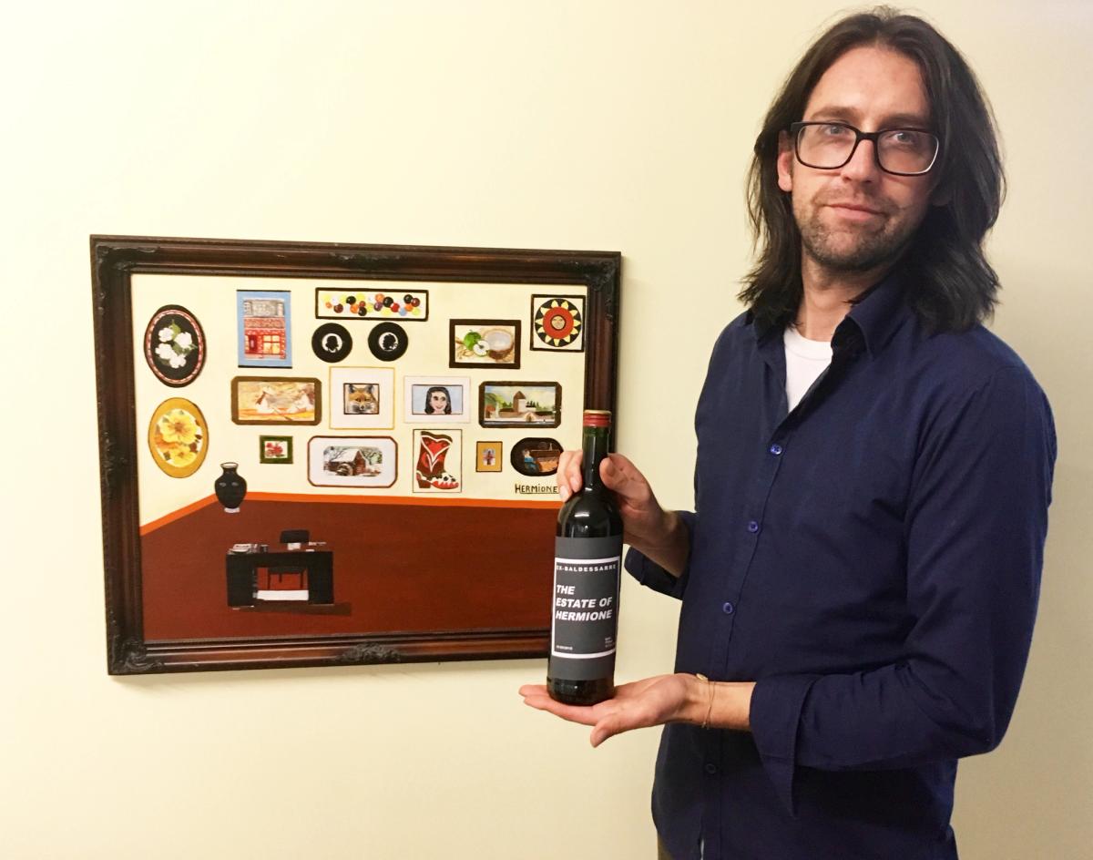 Andy Holden has painted the exhibition space to match the imagined retrospective that features in one of Hermione's paintings Photo: Louisa Buck