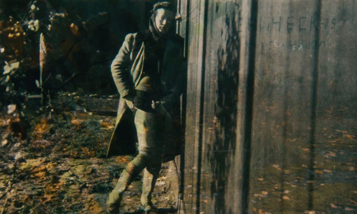 In a photograph from À pas aveugles (From Where They Stood) (2021), directed by Christophe Cognet, a camp prisoner rolls down her stocking to show the wound from a Nazi medical experiment © L'atelier documentaire