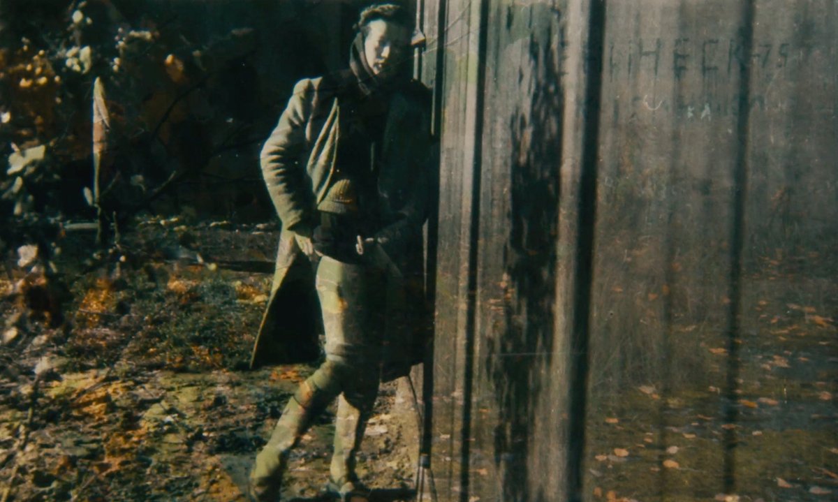 In a photograph from À pas aveugles (From Where They Stood) (2021), directed by Christophe Cognet, a camp prisoner rolls down her stocking to show the wound from a Nazi medical experiment © L'atelier documentaire