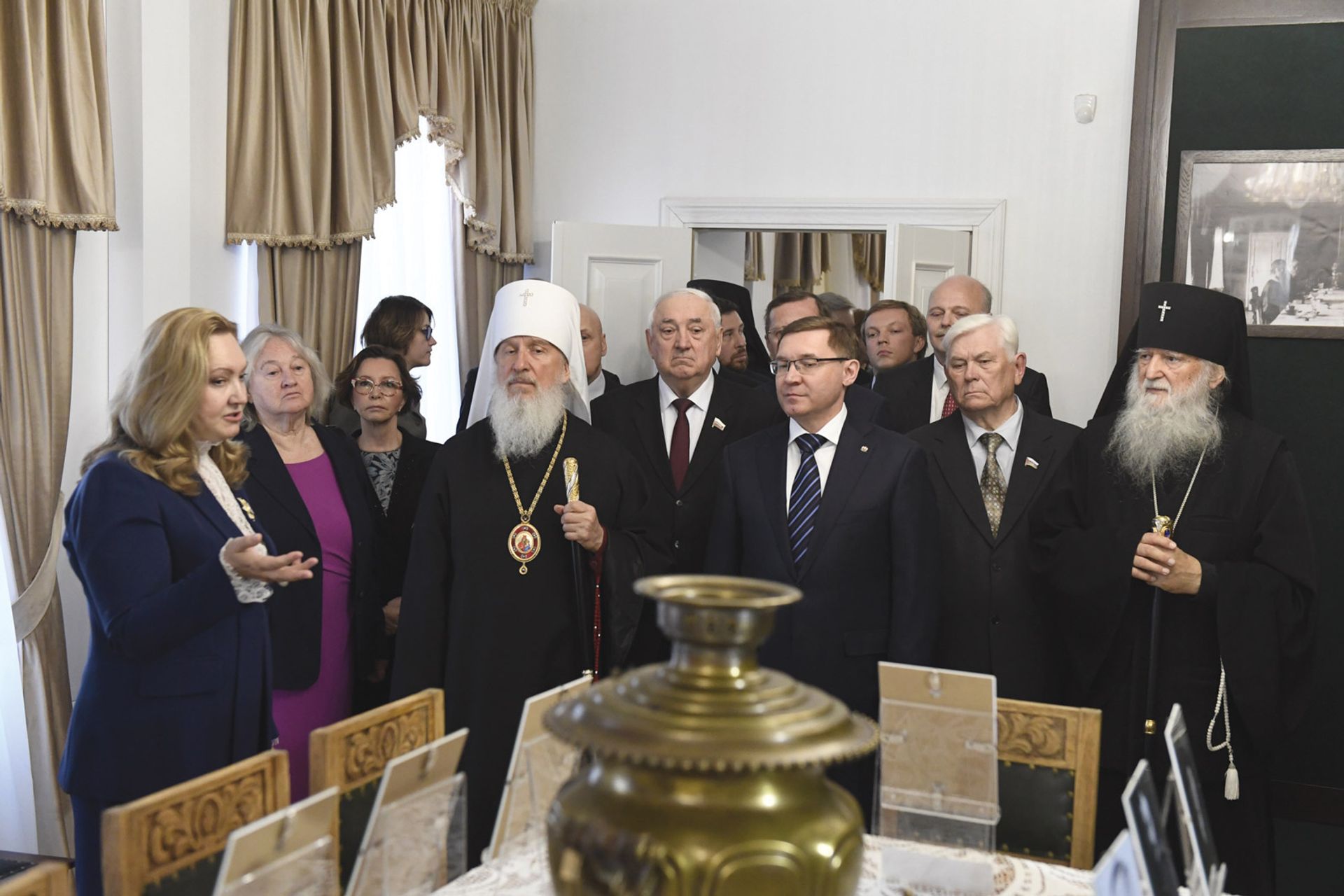 The historian Anna Gromova (far left), who oversaw the curatorial side of the new museum and Paul Kulikovsky (back row, far right), a great-great grandson of Tsar Alexander III, with dignitaries from the Russian Orthodox Church at the opening Sergey Rusanov